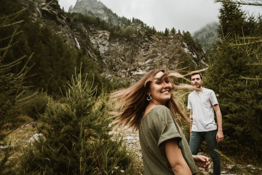 As mountain lovers, getting to photograph a pre-wedding session in the Italian Alps is what makes our days special! These two wonderful guys share our same passion and love for the outdoors, so we chose together a setting that best could convey this love of theirs. The Italian Alps are an endless source of inspiration and an infinite playground for us, they offer the best settings for adventurous elopements and adventurous sessions for those couples looking for an alternative way to celebrate their love! Our "side" of the alps is certainly not as famous and well known as the Dolomites and it is definitely not as popular as the western side when it comes to eloping. This does not mean, not for a bit, that they are less beautiful or less dramatic than their western sisters. In fact, they might even be a better option especially during those busier months of the year as the amount of tourists here is consistently lower.