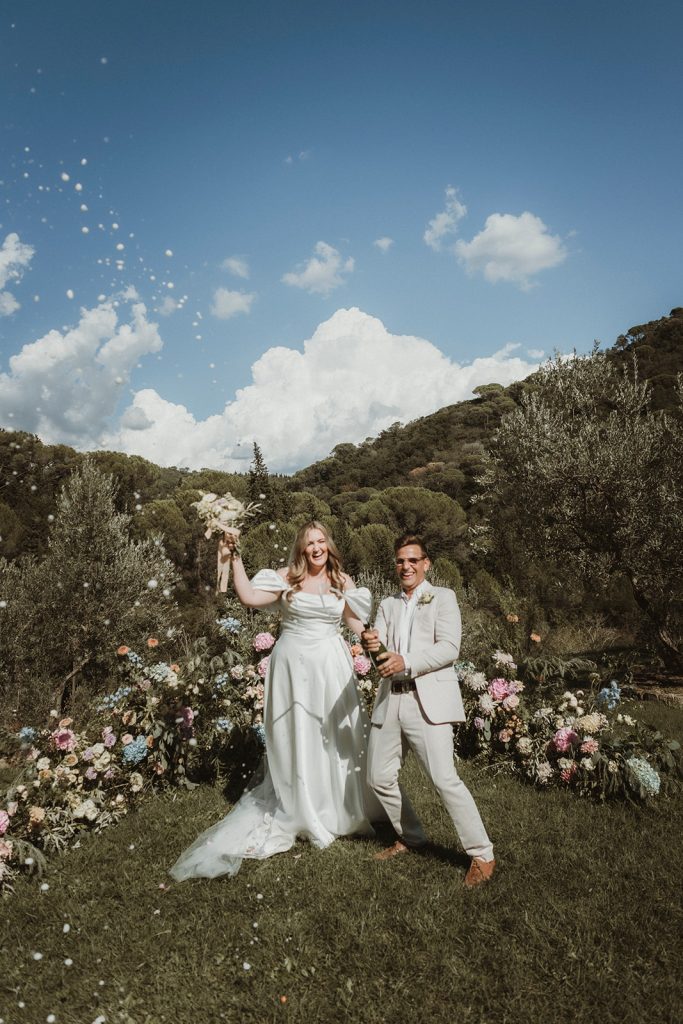 couple toasting on their elopement day in Italy
