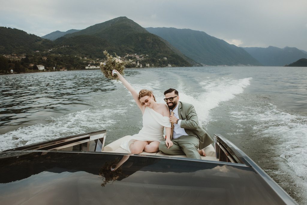 Lake Como Elopement - couple enjoying their boat ride on Lake Como