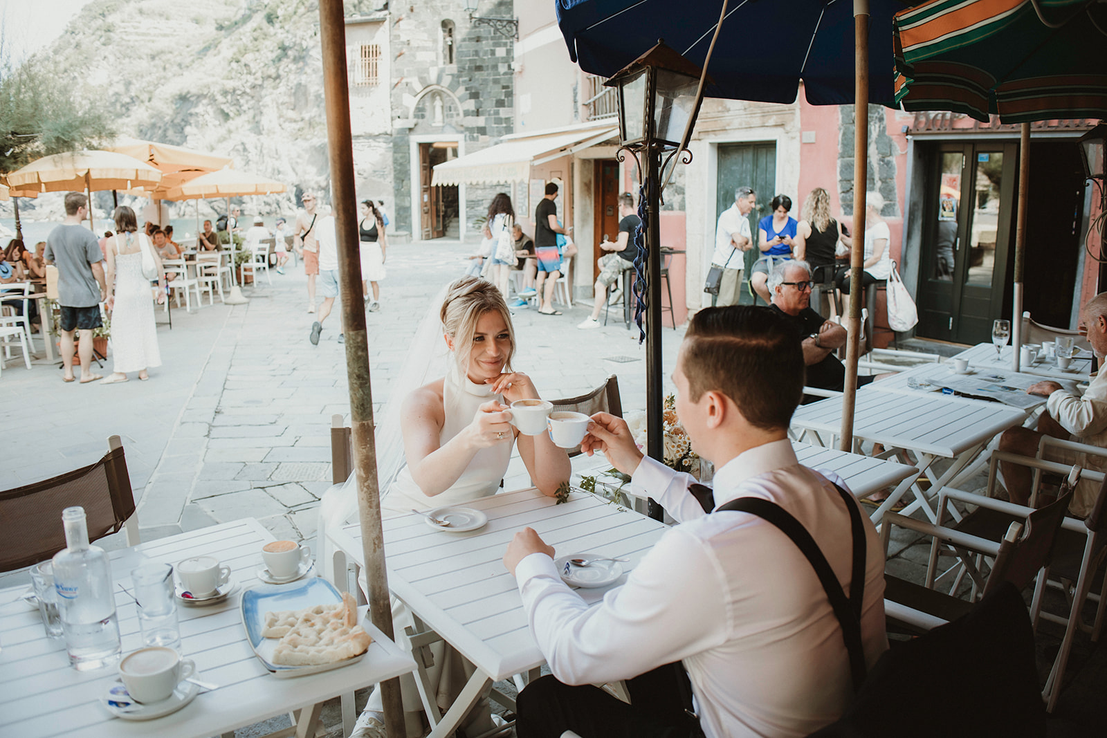 Hailey & Kevin Couple enjoying post-ceremony breakfast at sunrise elopement in Italy