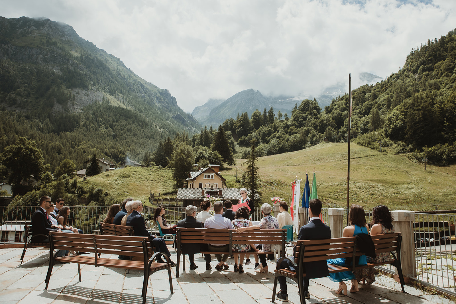 Small wedding party for an elopement in the Italian Alps during a civil ceremony