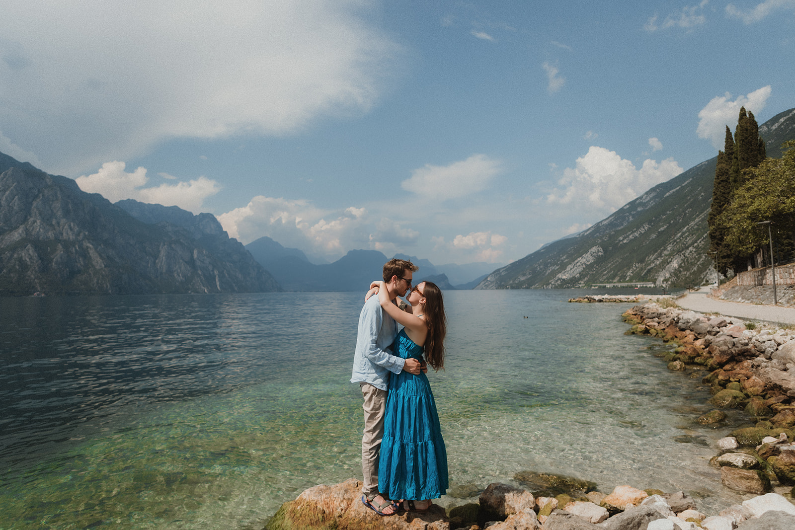 Couple embracing by lake garda during their Italy elopement.