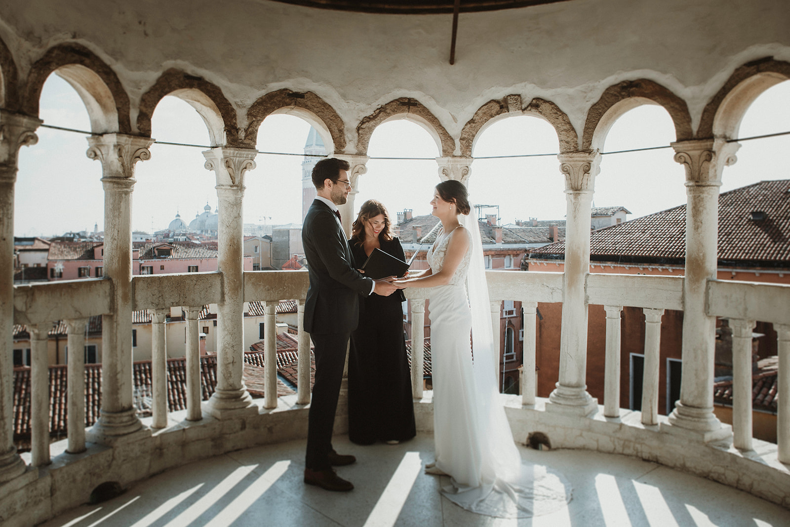 Couple on their symbolic ceremony during their elopement in Venice, Italy