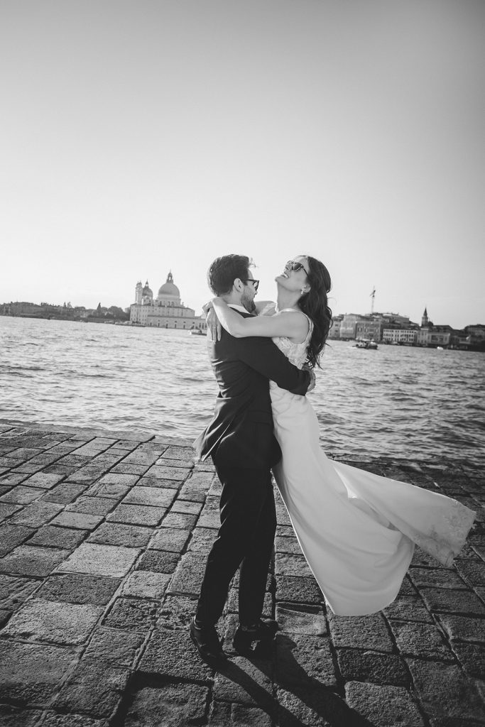 Couple candidly enjoying the moment as they elope in Venice