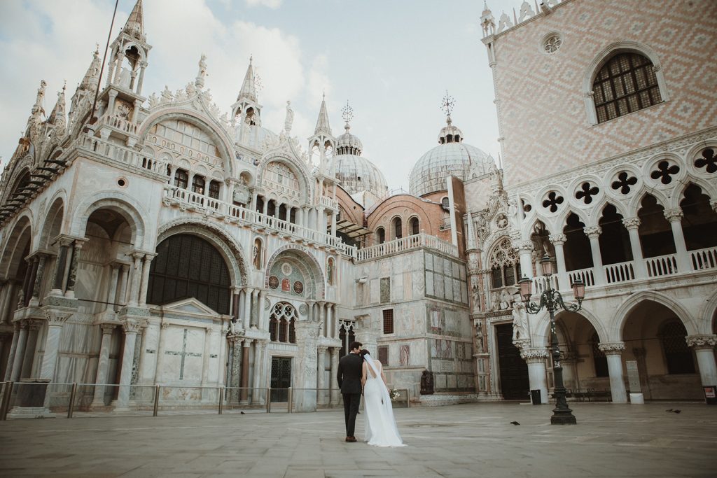 Venice Elopement - Couple enjoying the Piazza San Marco on their sunrise elopement
