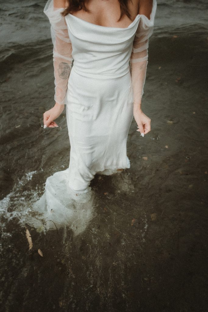 Details of a bridal dress during a trash the dress shot in Northern Italy
